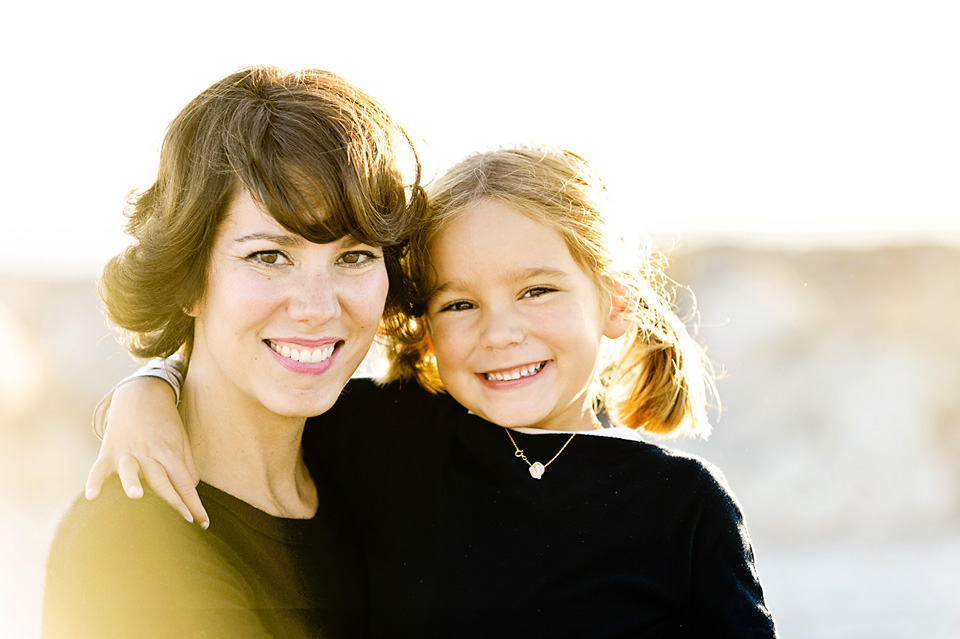 Mother and daughter backlit